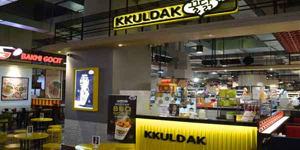 Kkuldak shop front in lippo mall puri st. moritz