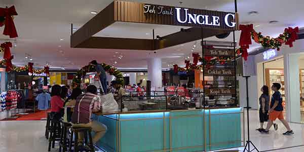 Uncle G shop front in lippo mall puri st. moritz